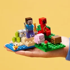 LEGO Puzzles Y Construcciones*Set Para Construir La Emboscada Del Creeper Con Mini Figuras De Steve, Cerdito Y Pollo Minecraft